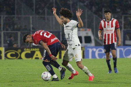 Photo for December 3, 2023, Mexico City, Mexico: Csar Huerta of Pumas of the UNAM in action  against Cristian Caldern  of Chivas of Guadalajara during the second leg of the quarterfinals of the  Opening Tournament of MX League - Royalty Free Image