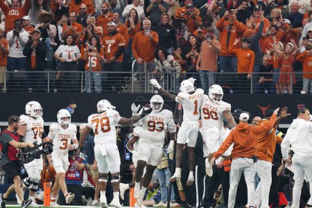 Photo for December 2, 2023, Arlington, Texas, United States:  Texas Longhorns  Xavier Worthy celebrates the touchdown during the 2023 Dr Pepper Big 12 Championship game between Texas Longhorns  and Oklahoma State Cowboys - Royalty Free Image