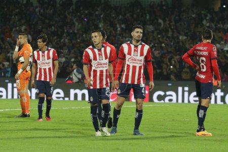 Photo for December 3, 2023, Mexico City, Mexico:Players of Chivas of Guadalajara during the second leg of the quarterfinals of the  Opening Tournament of MX League  at the Olimpico Universitario stadium - Royalty Free Image