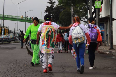 Photo for December 11, 2023 in Mexico City, Mexico:  Thousands of pilgrims from various states of Mexico walk on Ignacio Zaragoza Avenue towards the Basilica of Guadalupe to celebrate the day of the Virgin - Royalty Free Image