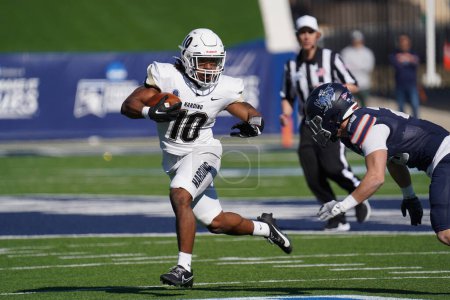 Photo for December 16, 2023, McKinney, Texas, United States: Harding's running back Jhalen Spicer avoid a tackle during the NCAA Division II Football Championship between Harding University and Colorado School of Mines played at McKinney ISD Stadium - Royalty Free Image