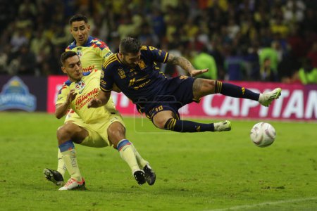 Photo for December 17, 2023, Mexico City, Mexico: Andre Pierre Gignac of Tigres of UANL in action against Sebastin Cceres and Luis Fuentes of Club America - Royalty Free Image