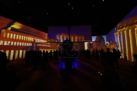 Photo for December 18, 2023 in Mexico City, Mexico: People take a tour of the exhibition 'Beyond Tutankhamun, the immersive experience', which reconstructs the tomb and treasures of Pharaoh Tutankhamun, in commemoration of the 100 years of his discovery - Royalty Free Image