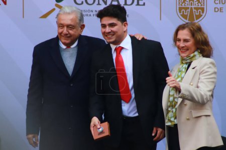 Photo for December 19, 2023 in Mexico City, Mexico: The president of Mexico, Andrs Manuel Lpez Obrador, Major League Shortstop Luis Urias and  Beatriz Gutirrez Meller during the Award ceremony for the 2023 National Sports Award - Royalty Free Image