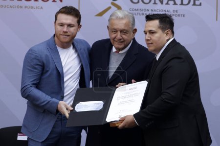 Photo for December 19, 2023, Mexico City, Mexico: The president of Mexico, Andres Manuel Lopez Obrador, presented the 2023 National Sports Award to Edison Reynoso, winner of boxer Saul Canelo Alvarez, at the National Palace in Mexico City - Royalty Free Image
