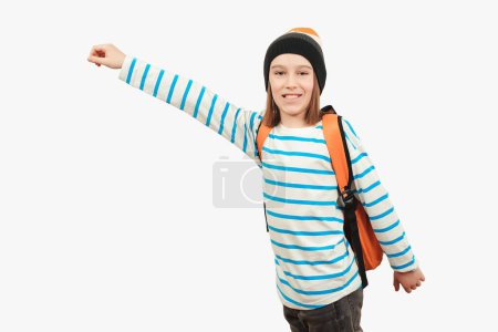 Photo for School boy with backpack. Education concept. Back to school. Boy in casual clothes with schoolbag is ready for studing. Student goes forward. - Royalty Free Image