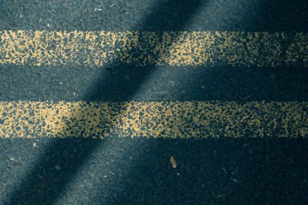 Photo for The two yellow lines of a road marking in England - Royalty Free Image