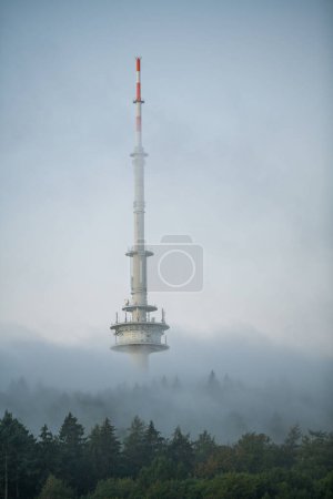 Photo for TV tower in the Teutoburg Forest in Bielefeld surrounded by fog - Royalty Free Image