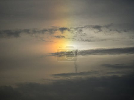 Photo for Weather light in the form of a kind of rainbow next to the sun: parhelion. - Royalty Free Image