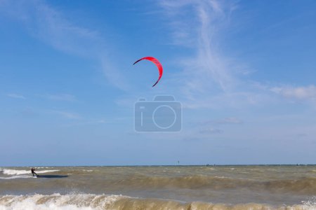 Photo for Toronto Ontario Canada Person kiteboarding in Toronto at Kew beach on Lake Ontario on a windy day - Royalty Free Image