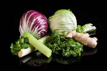 Photo for Salad element, Lettuce still life, Vegetable composition, Cichorium Endiva, Curly endive, Iceberg lettuce, Corn Salad, Radicchio, Italian chicory, Leek, Ginger - Royalty Free Image