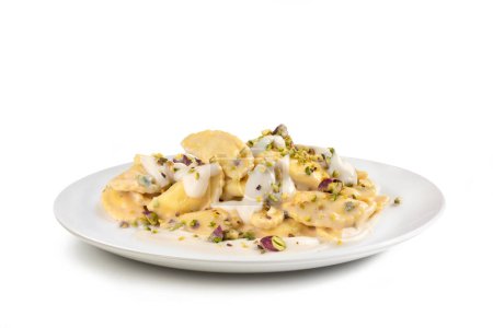Foto de Agnolotti crema de pasta y pistacho - Estilo de comida italiana, plato de pasta italiana - Imagen libre de derechos