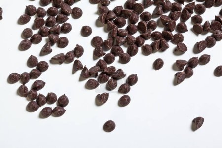 Photo for Chocolate chips on white background - Royalty Free Image