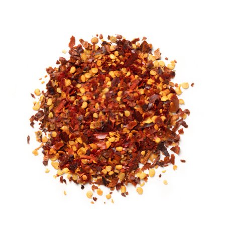 Photo for Dried Red Chilli Flakes  Pile of Crushed Red Pepper with Seeds, Raw Hot Spice in Bulk  Top View, Close-Up Macro, from Above  Isolated on White Background - Royalty Free Image