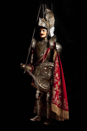 Photo for Pupo, Sicilian Puppet on Black Background  Traditional Souvenir "Opera dei Pupi", UNESCO Heritage Art, Matter of France or Carolingian Cycle Character - Orlando  Close-Up Macro, High Resolution - Royalty Free Image