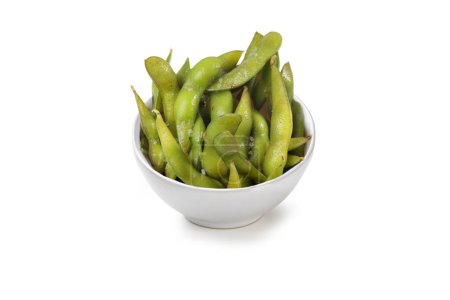 Photo for Edamame in pod with Himalayan pink salt, isolated on white background - Royalty Free Image