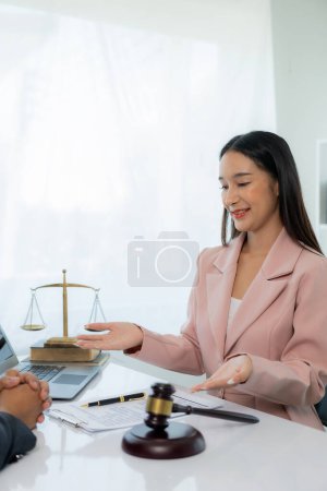 Photo for Legal genius female lawyer working with laptop in law office, judge hammer with justice, justice concept - Royalty Free Image
