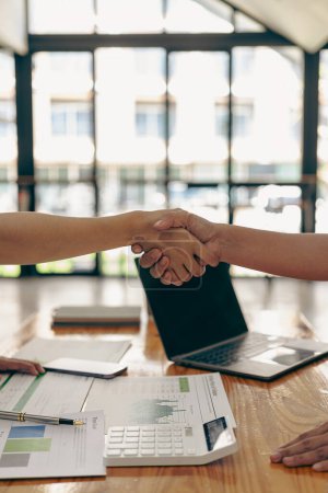 Photo for Thank you for letting me be part of the team. Cropped view of two businessmen shaking hands during meeting for success in job interview in business office Thank you partner, close-up photo - Royalty Free Image