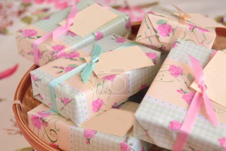 Wedding favours baptism communion souvenirs gift boxes with floral paper wrapping pink and green ribbon, baby girl shower presents, handmade soaps