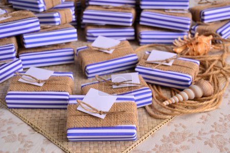 Beach nautical wedding favours decoration gift box with blue white stripe pattern, jute and custom label, handmade soap souvenir, sailor style party present