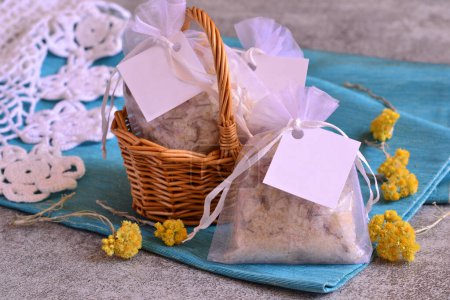 Summer wedding party favors scented sachet on blue background, small gifts for baby boy shower, original guest souvenirs diy bath salt