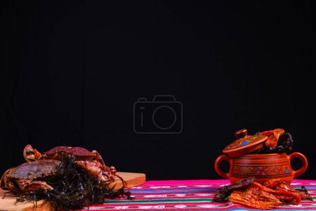 Photo for Image where you can see the different chilies that are in Peru and its rich crabs on a typical tablecloth from the mountains of Peru - Royalty Free Image