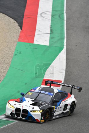 Photo for Mugello Circuit, Italy - October 21, 2022: BMW M4 GT3 driven by Glock - Klingmann of team BMW Italia-Ceccato Racing in action during qualifying session of Italian Championship GT - Royalty Free Image