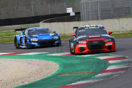 Photo for Scarperia, 23 March 2023: Audi RS3 LMS DSG TCR of Team AIKOA Racing in action during 12h Hankook Race at Mugello Circuit in Italy. - Royalty Free Image