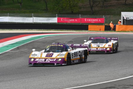 Photo for Scarperia, 2 April 2023: Jaguar XJR-8 year 1987 in action during Mugello Classic 2023 at Mugello Circuit in Italy. - Royalty Free Image