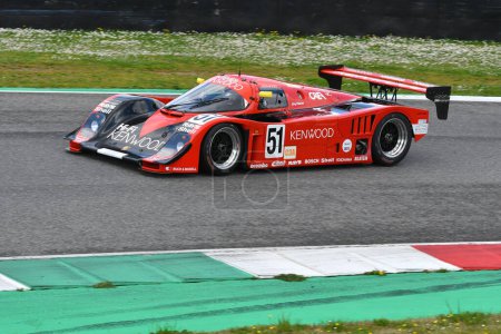Photo for Scarperia, 2 April 2023: Porsche 962 C year 1991 in action during Mugello Classic 2023 at Mugello Circuit in Italy. - Royalty Free Image