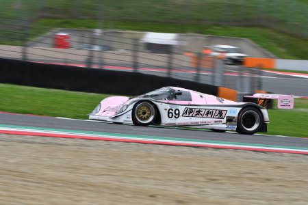 Photo for Scarperia, 2 April 2023: Porsche 962 C year 1990 in action during Mugello Classic 2023 at Mugello Circuit in Italy. - Royalty Free Image