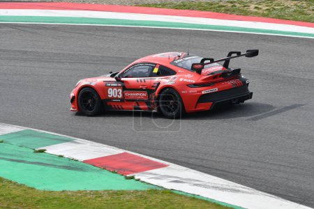 Photo for Scarperia, 23 March 2023: Porsche 911 GT3 Cup 992 of Team Red Ant Racing drive by Redant-Kobe de Breucker in action during 12h Hankook Race at Mugello Circuit in Italy. - Royalty Free Image