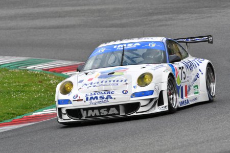 Photo for Scarperia, 2 April 2023: Porsche 997 GT3 RSR year 2009 in action during Mugello Classic 2023 at Mugello Circuit in Italy. - Royalty Free Image