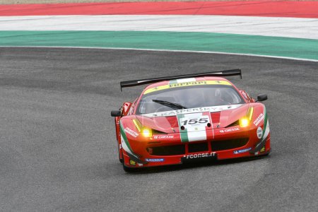 Photo for Scarperia, 2 April 2023: Ferrari 458 GTE year 2011 in action during Mugello Classic 2023 at Mugello Circuit in Italy. - Royalty Free Image