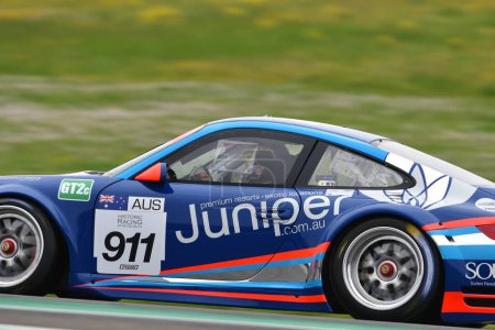 Photo for Scarperia, 2 April 2023: Porsche 997 GT3 R year 2008 in action during Mugello Classic 2023 at Mugello Circuit in Italy. - Royalty Free Image