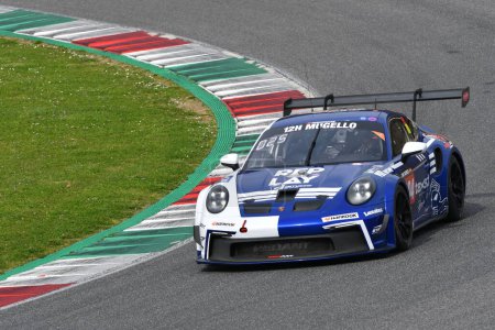 Photo for Scarperia, 23 March 2023: Porsche 911 GT3 Cup 992 of Team Red Ant Racing drive by Van Rompuy in action during 12h Hankook Race at Mugello Circuit in Italy - Royalty Free Image