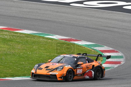 Photo for Scarperia, 23 March 2023: Porsche 911 GT3 Cup 992 of Team Red Camel-Jordans.nl drive by Breukers-Danz in action during 12h Hankook Race at Mugello Circuit in Italy. - Royalty Free Image