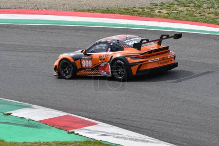 Photo for Scarperia, 23 March 2023: Porsche 911 GT3 Cup 992 of Team Red Camel-Jordans.nl drive by Breukers-Danz in action during 12h Hankook Race at Mugello Circuit in Italy. - Royalty Free Image