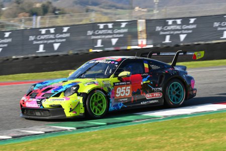 Photo for Scarperia, 23 March 2023: Porsche 911 GT3 Cup 992 of Team Willi Motorsport by Ebimotors drive by Broggi-Nicolae in action during 12h Hankook Race at Mugello Circuit in Italy. - Royalty Free Image