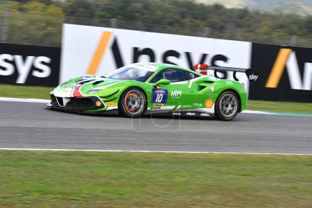 Photo for Scarperia - Italy, 28 October 2023: Ferrari 488 Challenge in action during Qualifyng Session of Ferrari Challenge World Finals 2023 at Mugello Circuit in Italy. - Royalty Free Image