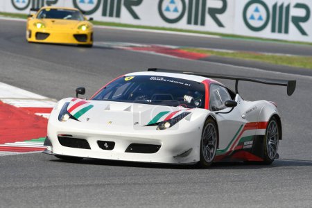 Photo for Scarperia - Italy, 28 October 2023: Ferrari 458 GT3 in action at the Mugello Circuit during Ferrari World Finals 2023 in italy. - Royalty Free Image