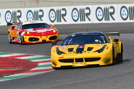 Photo for Scarperia - Italy, 28 October 2023: Ferrari 458 GT2 in action at the Mugello Circuit during Ferrari World Finals 2023 in italy. - Royalty Free Image