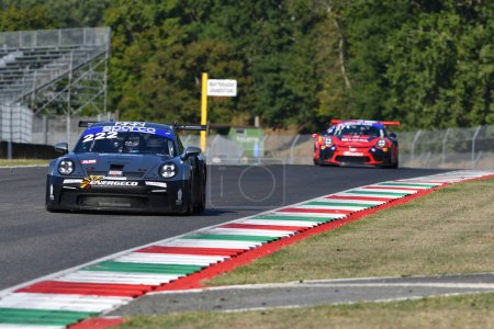Photo for Scarperia, 29 September 2023: Porsche 992 of team Krypton Motorsport drive by Pastorelli Luca and Pezzucchi Stefano in action during practice of Italian Championship at Mugello Circuit. Italy. - Royalty Free Image
