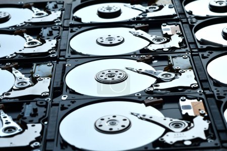 Photo for Group of hard disk drives. Many Open Hard drives. Close-up of the inside of PC hard drives. Technology background. Selective focus - Royalty Free Image