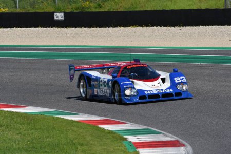 Photo for Scarperia, 5 April 2024: Nissan R90CK group C year 1990 in action during Mugello Classic 2024 at Mugello Circuit in Italy. - Royalty Free Image