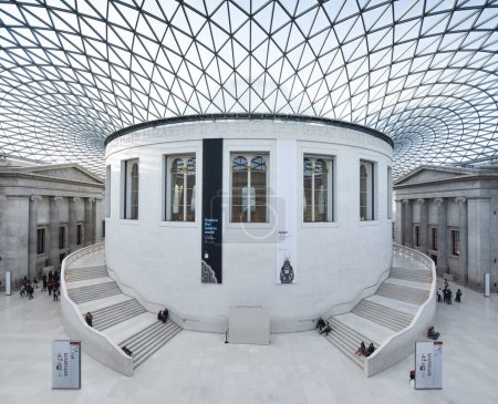 Photo for Symmetrical view of The Great Court of British Museum, showing greek ionic columns and geometric, triangular glass ceiling - Royalty Free Image
