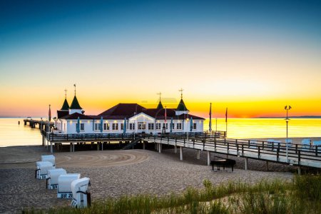 Photo for Sunrise on the pier in Ahlbeck on the island of Usedom on the Baltic Sea - Royalty Free Image