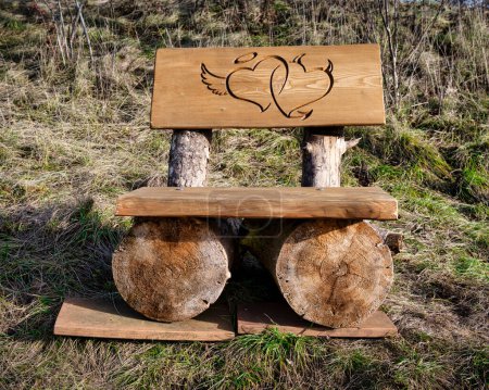 Photo for Bench made from a tree trunk to relax on - Royalty Free Image