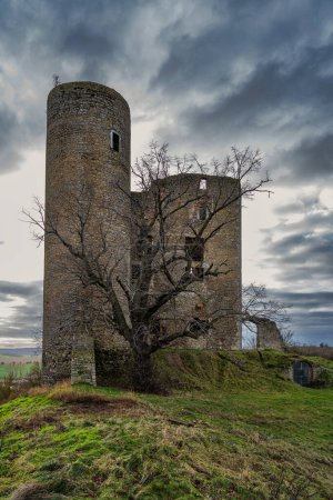 Photo for A view of Arnstein Castle in winter with dark clouds in the sky - Royalty Free Image