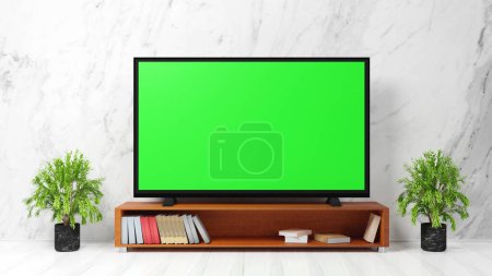 TV écran vert vierge sur table en bois dans le salon avec des murs blancs. Avec espace de photocopie, design publicitaire et relations publiques